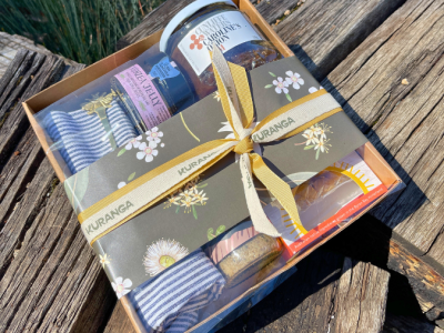 Savoury Harvest Christmas Boxed Hamper featuring chutney, pesto, quince jelly, curry macadamias, Bonnie & Neil cutlery, and a festive tea towel.