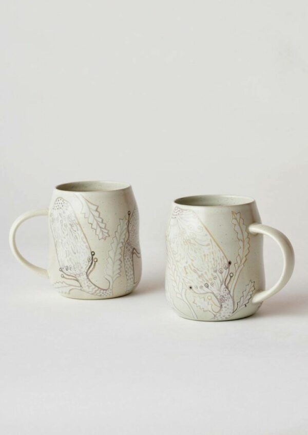 Angus & Celeste Everyday Mug Set – two stoneware mugs with a Banksia design and beehive shape.