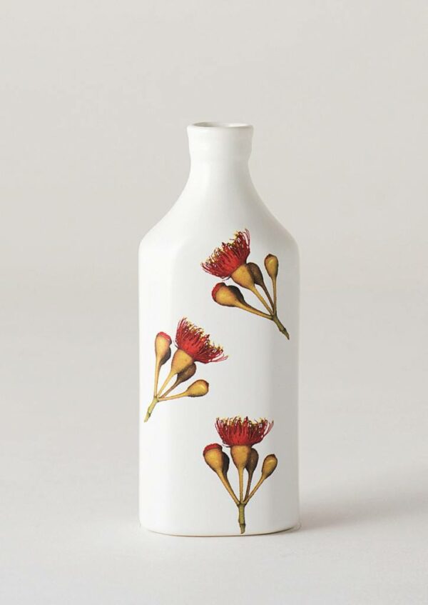 Angus & Celeste Botanic Bottle bud vases in Flowering Gum prints, styled on shelf