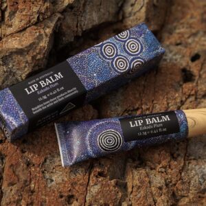 Kakadu Plum Lip Balm tube featuring Aboriginal artwork by Alma Granites.