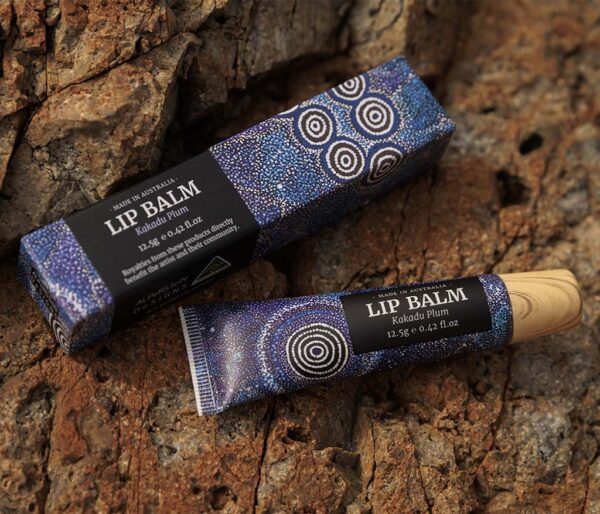 Kakadu Plum Lip Balm tube featuring Aboriginal artwork by Alma Granites.