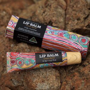 Lemon Myrtle Lip Balm tube featuring Aboriginal artwork by Judy Napangardi Watson.