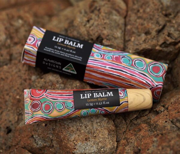Lemon Myrtle Lip Balm tube featuring Aboriginal artwork by Judy Napangardi Watson.