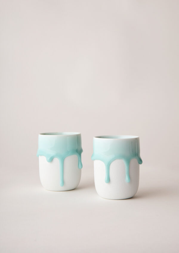 Angus & Celeste Drip Glaze White latte cups showing flowing drip glaze pattern on porcelain.