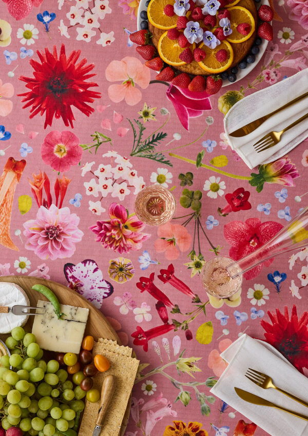 Angus & Celeste linen/cotton botanical tablecloth in Spring Flower Bomb styled with food