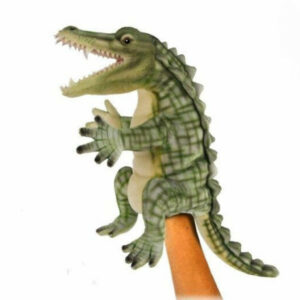 Green Hansa Crocodile Puppet with hand-airbrushed scale patterns, folded jaw showing white teeth, glossy eyes, and posable head and arms—posed upright on a white background.