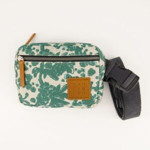Nancybird Belt Bag in Parsley print—compact canvas waist pouch featuring green botanical pattern on natural cotton base, adjustable cotton strap, front zip pocket and open rear pocket