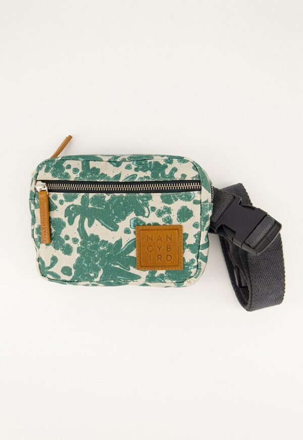 Nancybird Belt Bag in Parsley print—compact canvas waist pouch featuring green botanical pattern on natural cotton base, adjustable cotton strap, front zip pocket and open rear pocket