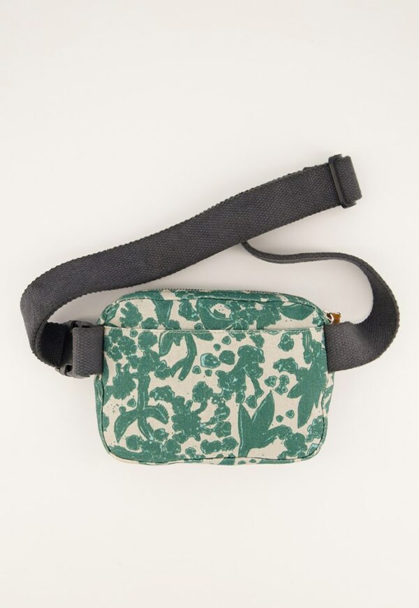 Nancybird Belt Bag in Parsley print—compact canvas waist pouch featuring green botanical pattern on natural cotton base, adjustable cotton strap, front zip pocket and open rear pocket