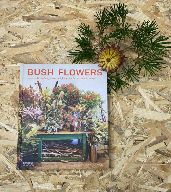 Cover of Bush Flowers: Australian Flowers and Foliage for Decoration and Design by Cassandra Hamilton and Michael Pavlou, featuring a vibrant arrangement of native Australian flowers such as banksias and flannel flowers, set against a natural backdrop. bookdp.com.au