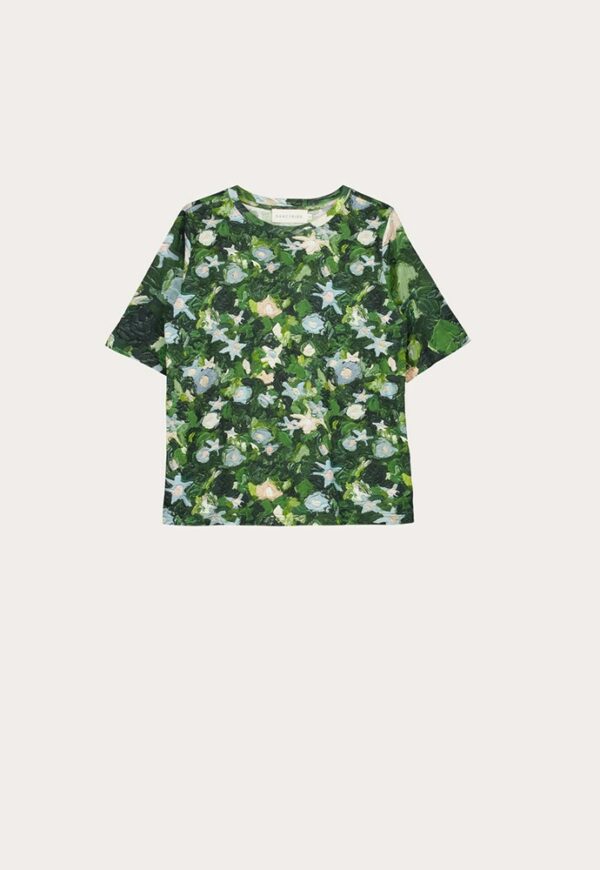Nancybird Grace Tee in Garden print—relaxed organic cotton crew‑neck tee featuring Emily Wright botanical artwork on light blue background