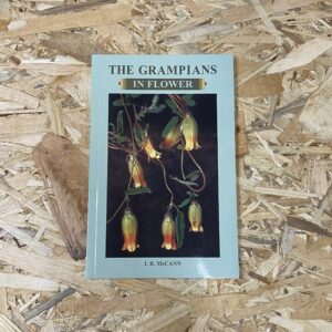 Cover of The Grampians in Flower by I.R. McCann, featuring a collage of vibrant native wildflowers set against the backdrop of Victoria's Grampians landscape.