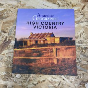 Cover of High Country Victoria – Australian Geographic showing snow-capped peaks, open plains, and native wildlife in a dramatic alpine setting.