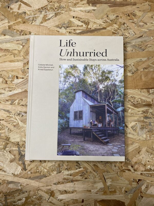 Cover of Life Unhurried: Slow and Sustainable Stays Across Australia, featuring a serene landscape with a minimalist off-grid cabin nestled amidst natural surroundings, reflecting the book's emphasis on slow living and sustainable travel.