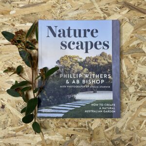 Cover of Naturescapes by Phillip Withers, featuring a lush, native garden filled with vibrant Australian plants, textured foliage, and natural stone paths.