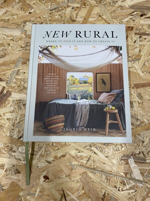 Cover of New Rural: Where to Find It and How to Create It by Ingrid Weir, featuring a serene Australian country home with natural textures and warm tones, set against a backdrop of open landscape.