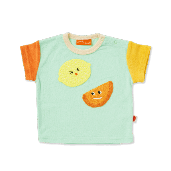 Halcyon Nights Peel Party Terry T Shirt—short sleeve kids tee in peach-coloured cotton terry with textured fruit applique and shoulder snap buttons