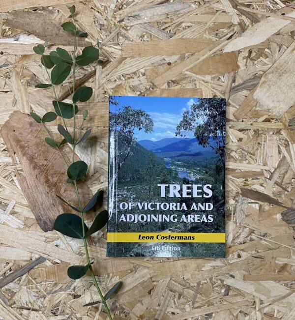 Cover of Trees of Victoria and Adjoining Areas by Leon Costermans, showing botanical illustrations of native Australian trees. Compact and ideal for bushwalkers, naturalists, and students.