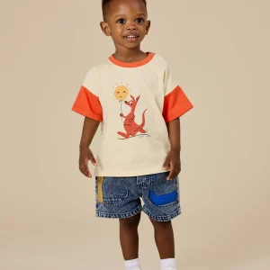 red kangaroo t-shirt worn with vintage washed denim short on young model
