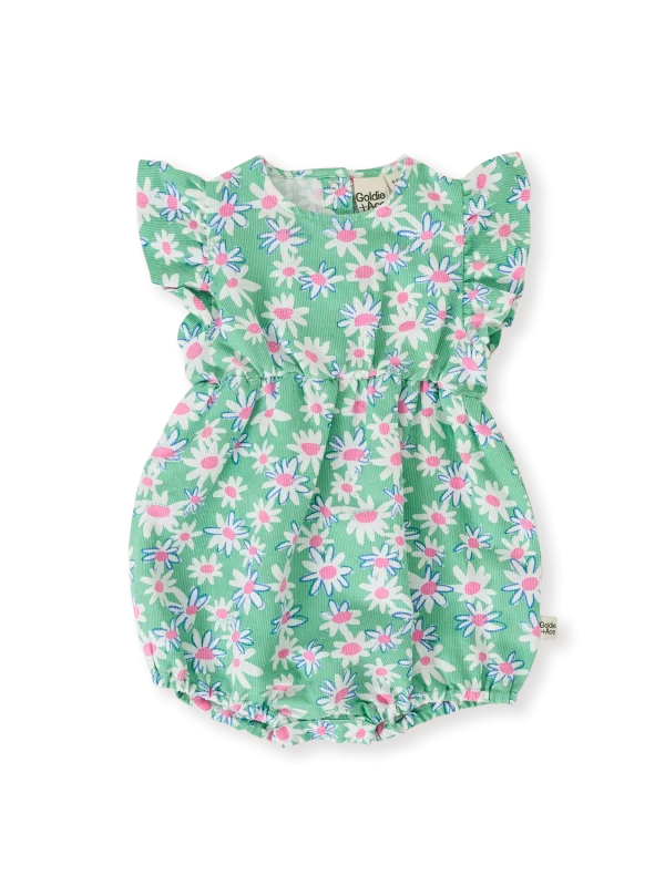 Flatlay of Goldie & Ace Daisy Patch Lani Romper in moss green, with frill sleeves and leg snaps.