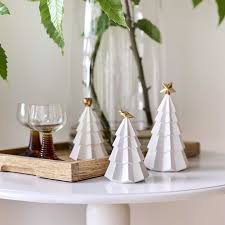 Robert Gordon Christmas 2026 Collection – white ceramic trees, hanging bells and Red Robin mugs styled on a festive table