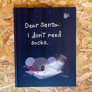 Dear Santa: I Don’t Need Socks book cover – koala writing a letter to Santa, Australian Christmas scene